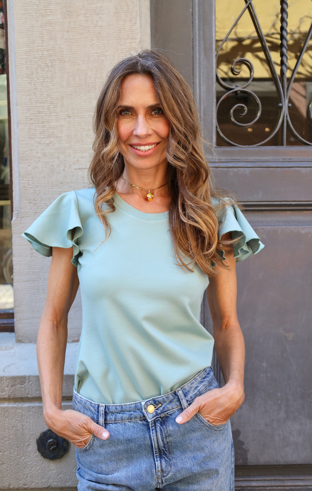 Top with flutter sleeves, mint green